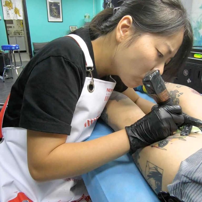 Evita-workig-at-DL-Tattoo_LR_1